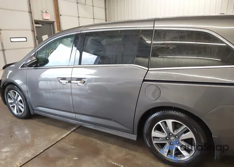 2014 Honda Odyssey Touring/Touring Elite z USA, uszkodzony, nr VIN 5FNRL5H96EB017019